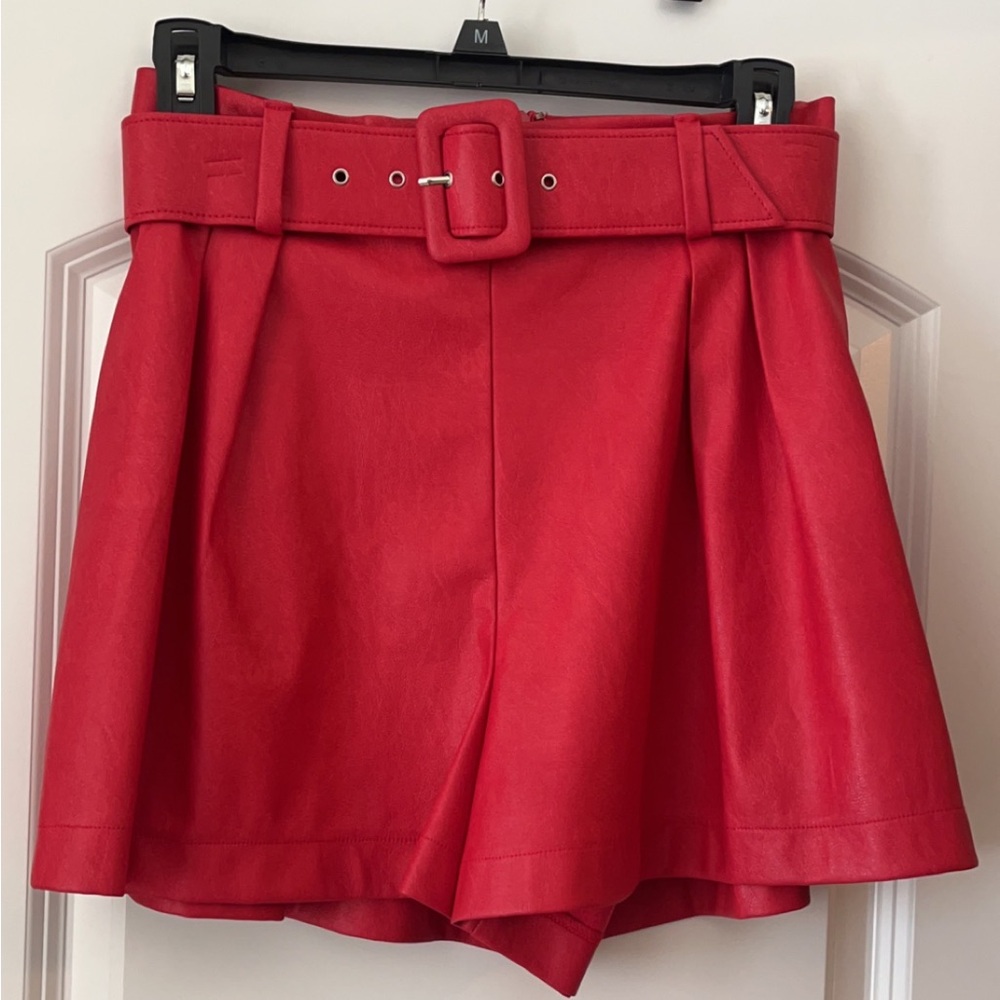 Red leather shorts with belt